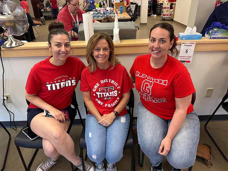 3 women smiling at the camera at Springfield Illinois ImpactLife Donor Center