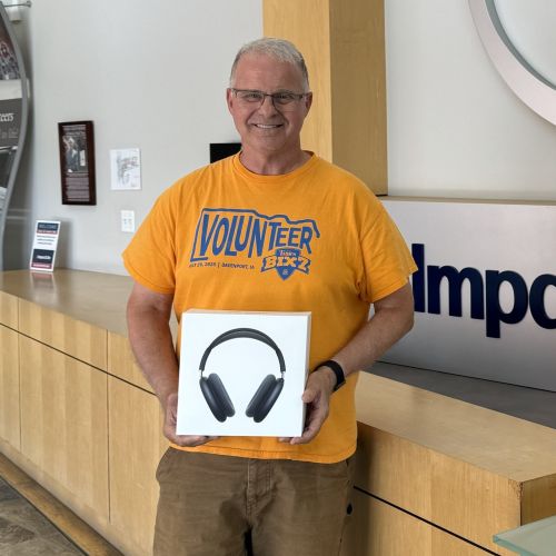 Man holding headphones