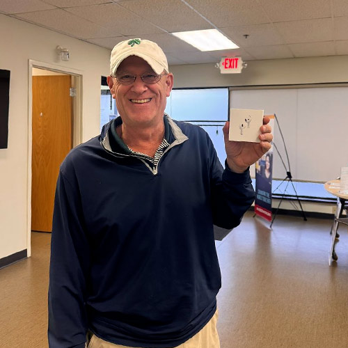 Man holding airpods