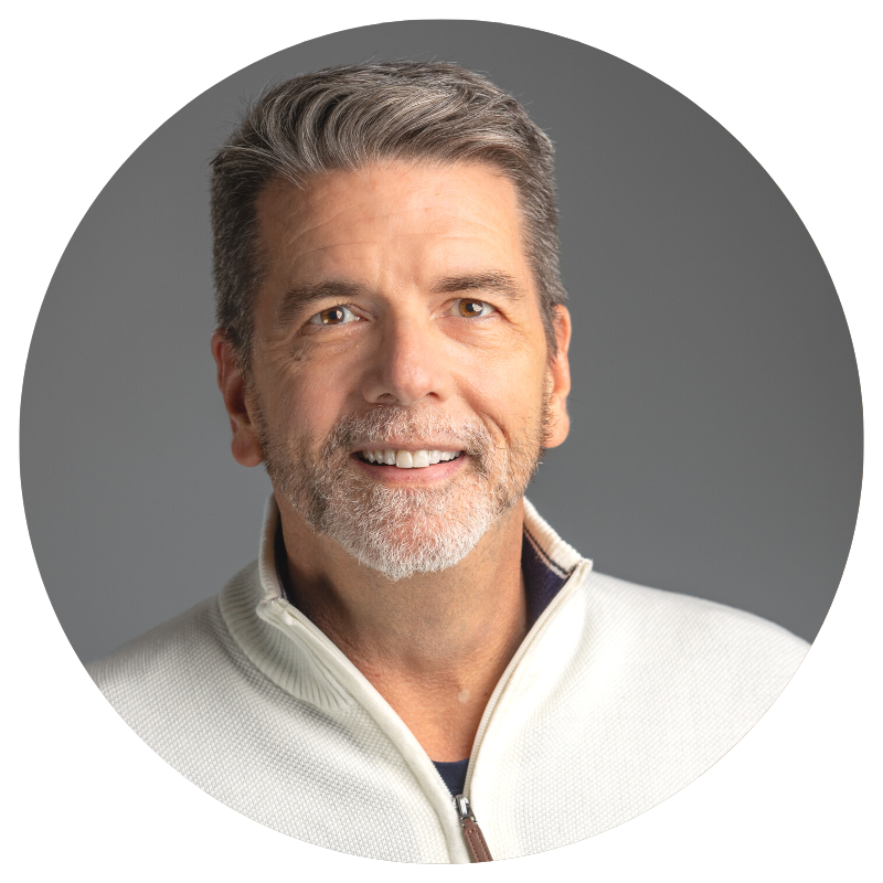 Photograph of a man smiling