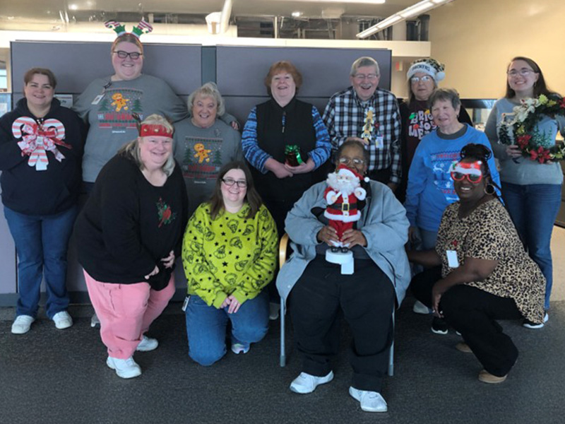 (left to right, back to front) Amanda Blake, Kaitlyn Pearson, Patti Ensey, Peggy Browne, Mick Bruce, Sherry Stark, Vicky Pendergast, Raya Bernauer Lynne Flores, Tiffany Bysinger-Ealy, Meia Teague, Akeia Shell