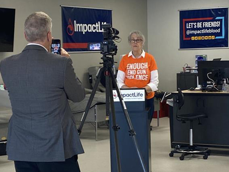 Blood donors looked on, while passionate people testified to the value of blood. Chief medical officer Dr. Daniela Hermelin and community relations manager Alex Fees represented ImpactLife. Dr. Janet Hyde spoke on behalf of Mom's Demand Action, an affiliate of Wear Orange.