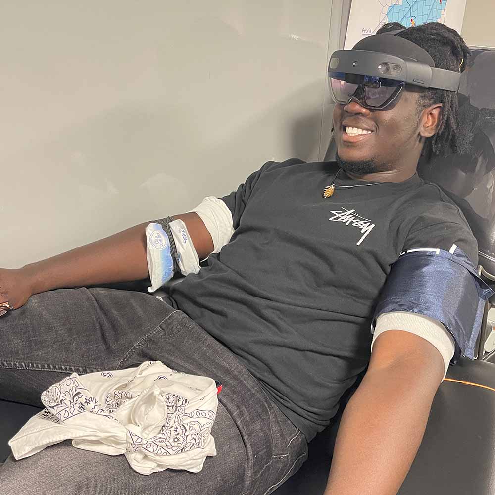 Student learning about blood donation through Mixed Reality