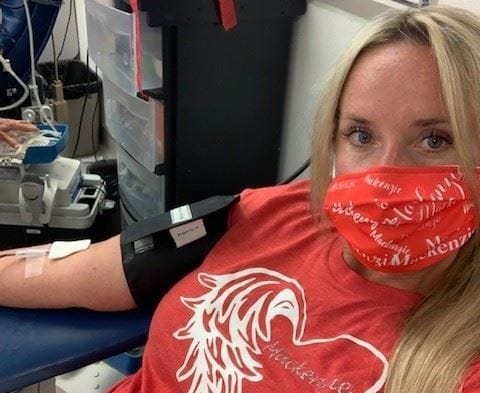 Melissa donating