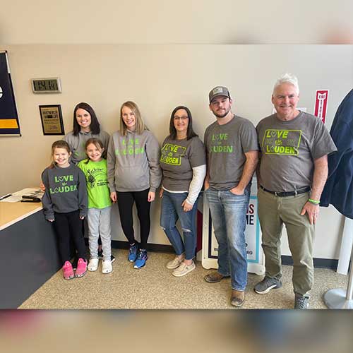 men and women standing side by side for a blood drive for love like louden with ImpactLife