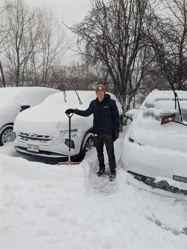 Madison IMD Alex Gralak clearing snow